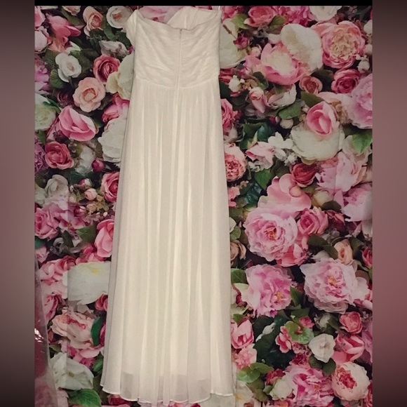 The brand is Cindy Collection. This dress is white, and a size small. - Picture 2 of 3